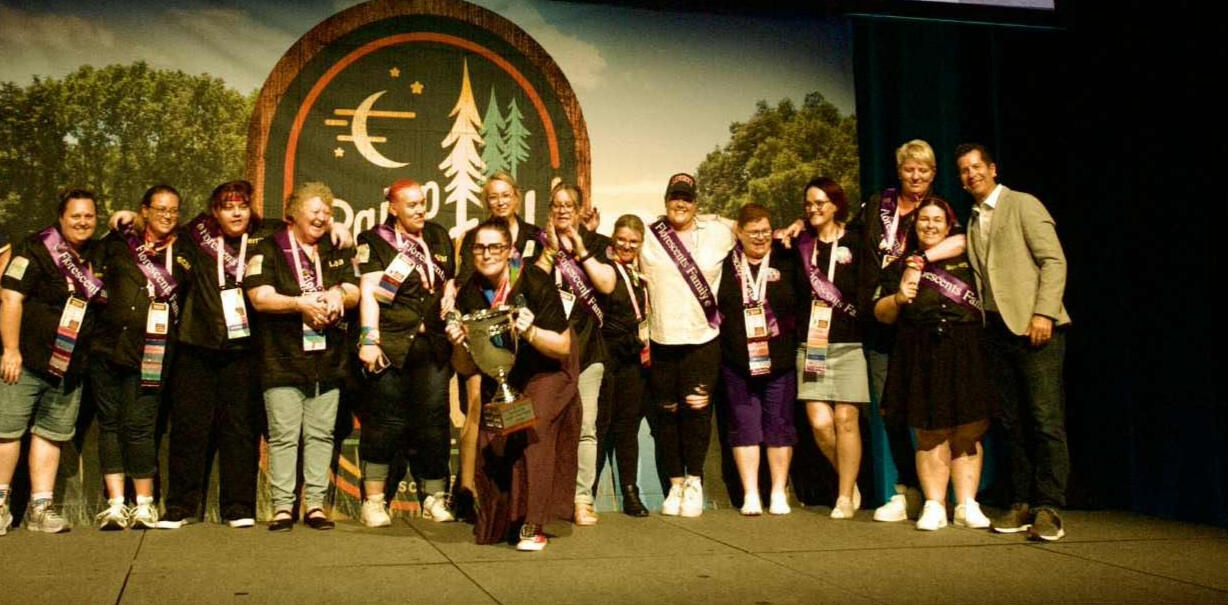 Liane and fellow Scentsy Consultants on stage at Scentsy Family Reunion 2025