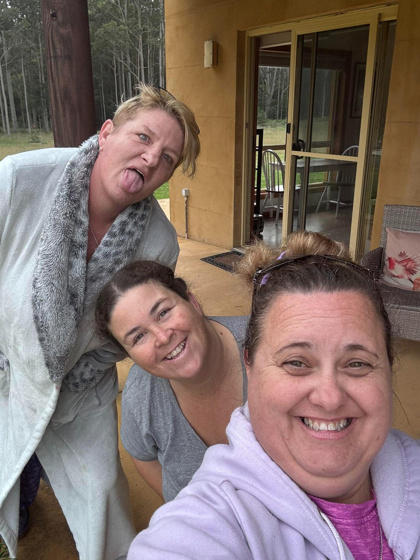 Liane smiling with friends during a Scentsy get together